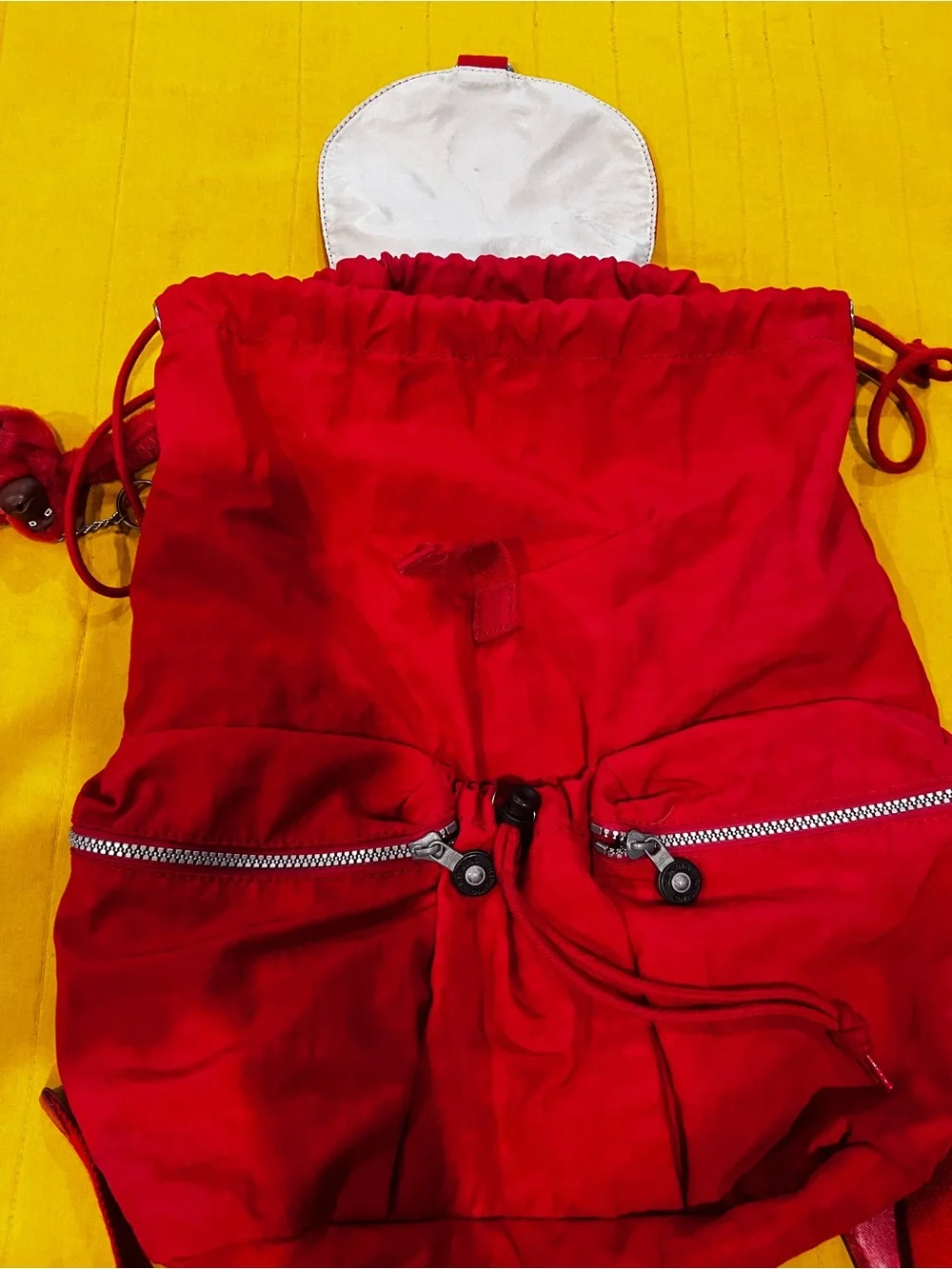 Kipling Lovebig Red Drawstring Backpack with Front Zip Pockets